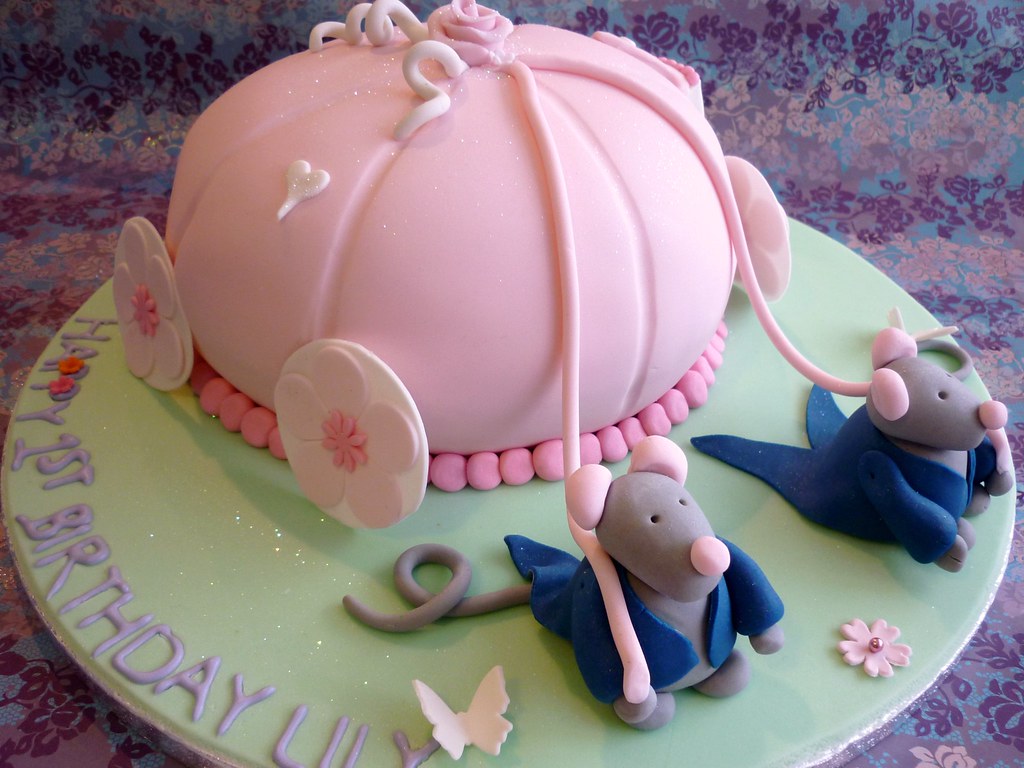 Cinderella themed carriage cake This cake was based on a M… Flickr