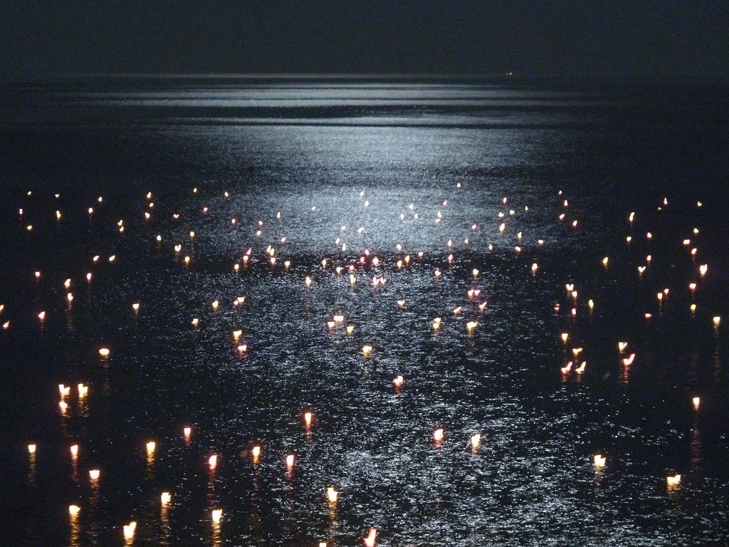 Floating candles in Celle Ligure Every year, on a midaugus… Flickr