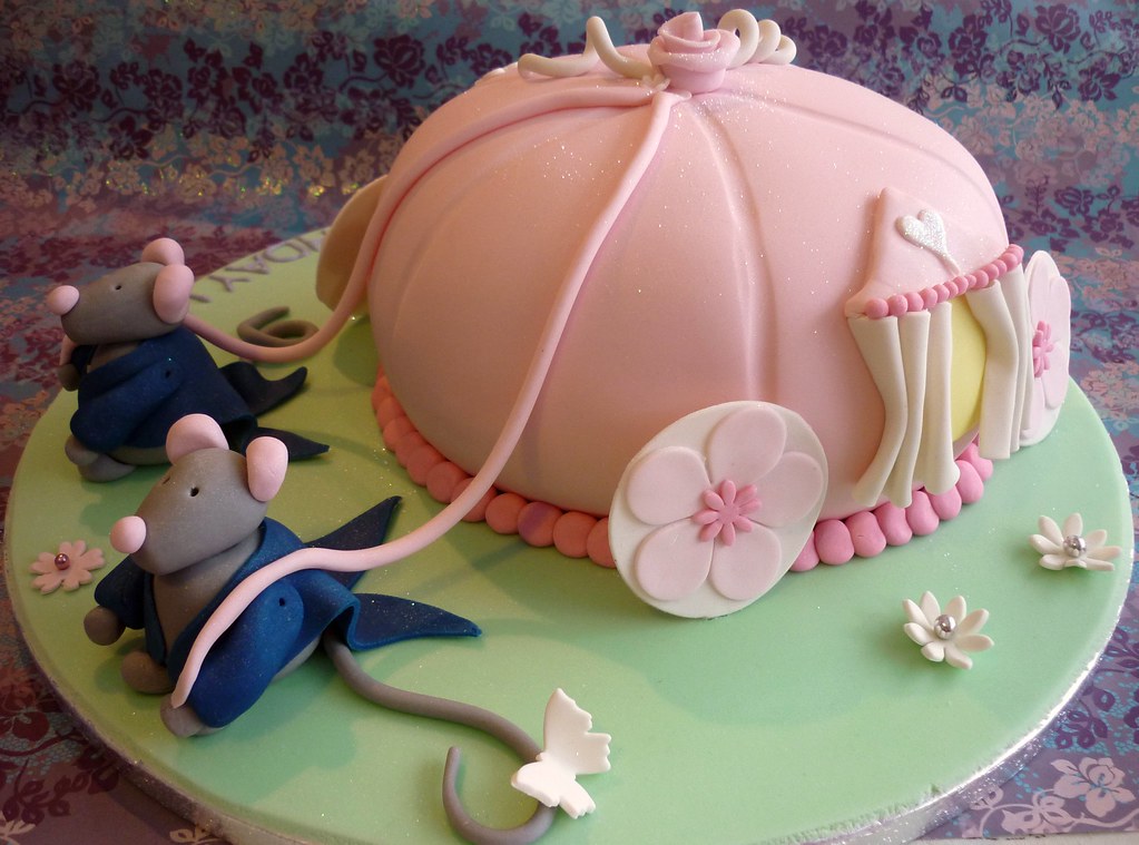 Cinderella themed carriage cake This cake was based on a M… Flickr