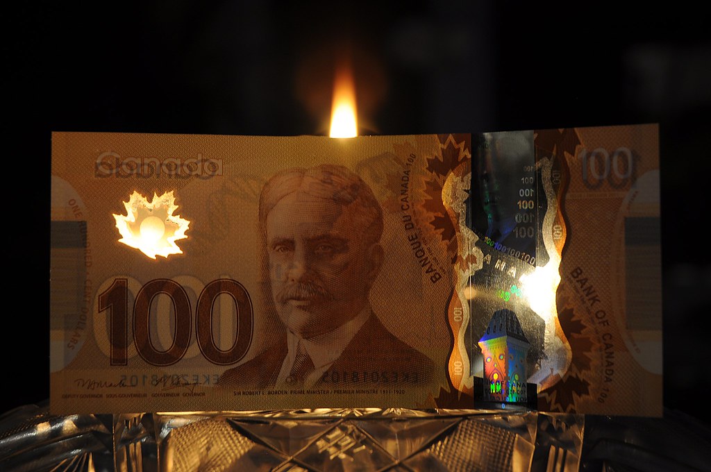 Plastic money on fire Canada's newly placed into circulati… Flickr