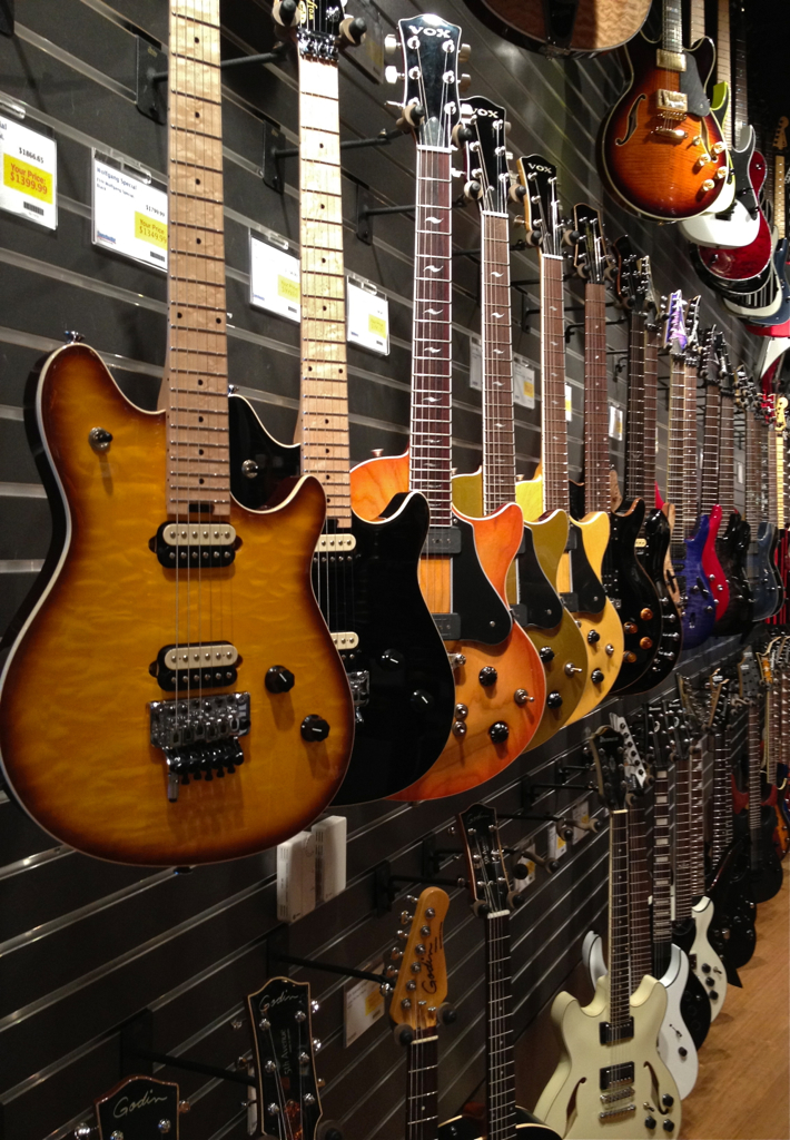 Sweetwater Store Guitar Wall One of the guitar walls in … Flickr