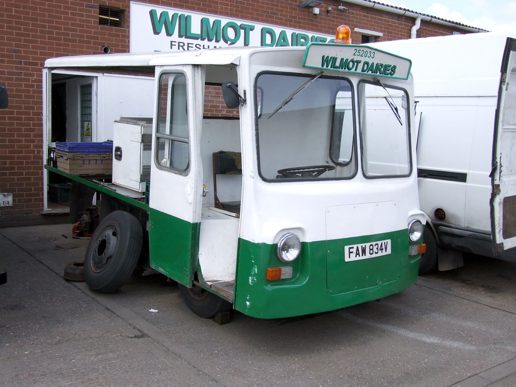 Electric Milk float under repair. Wilmot Dairies Milk floa… Flickr