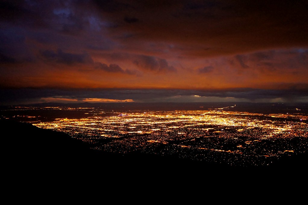 Threatening skies & city lights... Albuquerque as seen a… Flickr