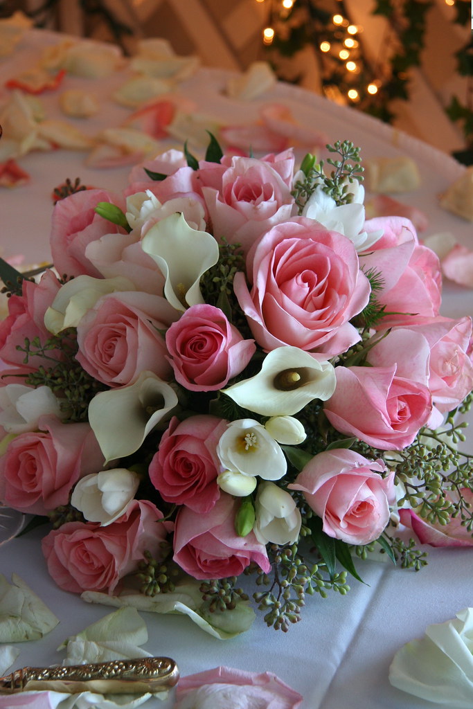 rose and calla lily wedding centerpiece This is a rose and… Flickr