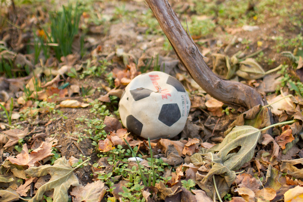 Deflated Soccer Ball We don't play here no more. JLovesCoffee Flickr