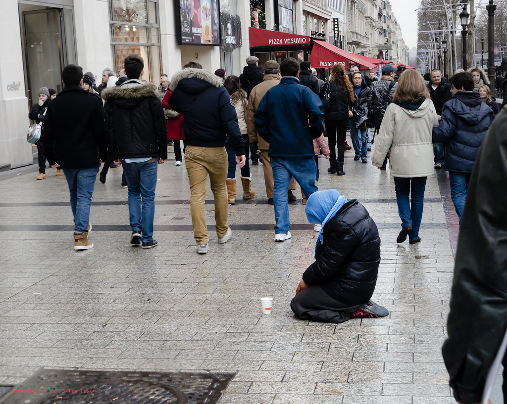 Ignoring the homeless woman on ChampsÉlysées I was surpri… Flickr