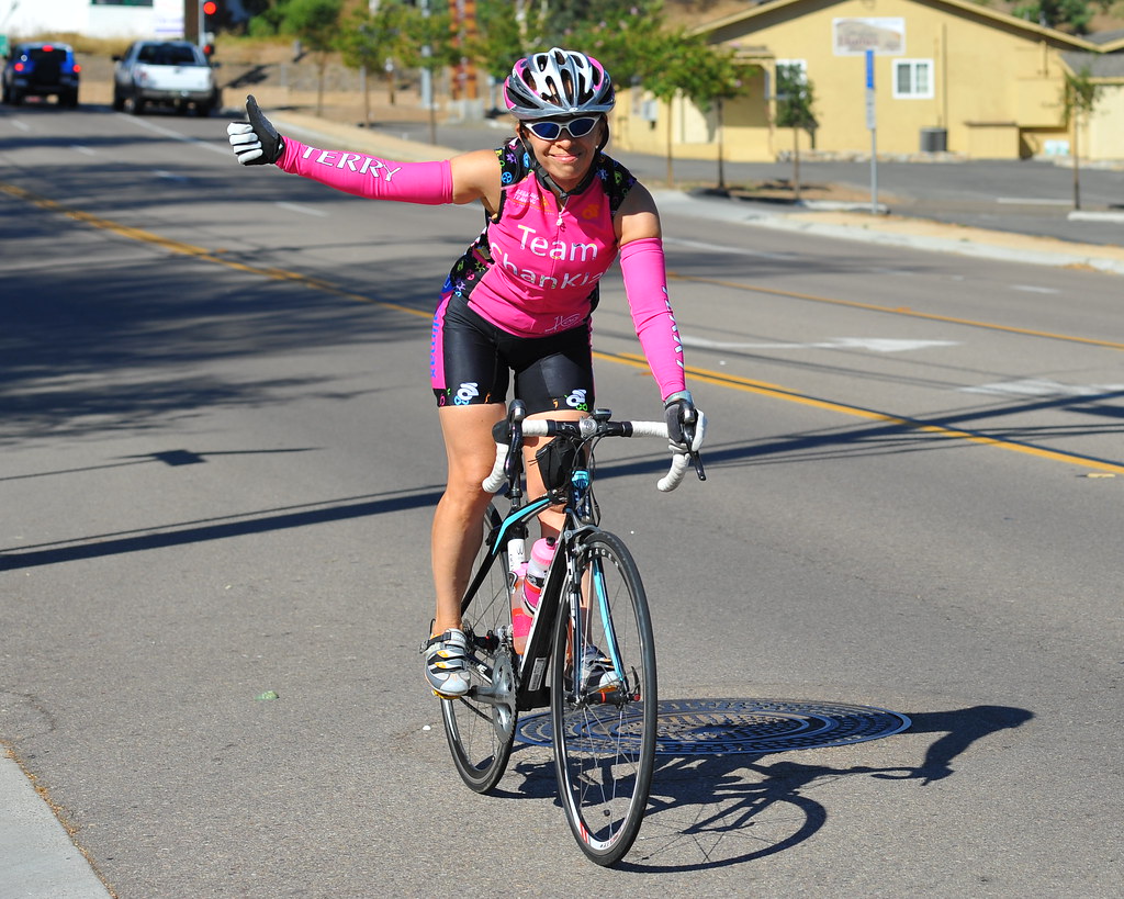Woman Cyclist Gives Thumbs Up A woman turns off from the G… Flickr
