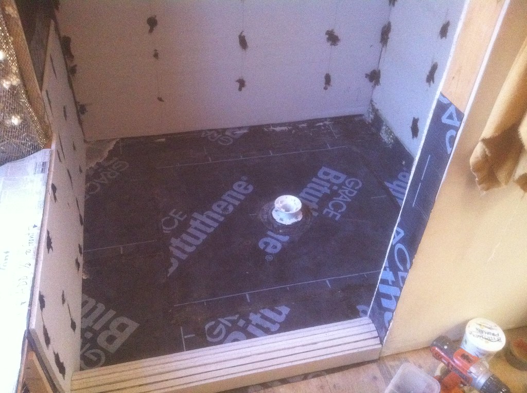 Cement board is put over the waterproof membrane scot