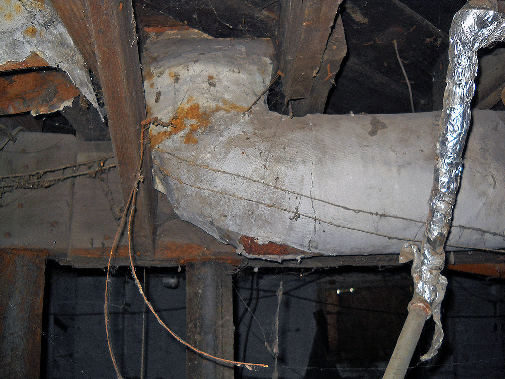 Damaged Asbestos Insulation on Home Duct Closer view of a … Flickr