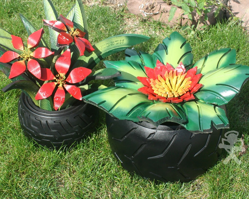 RECYCLED TIRES CUT OUT FROM OLD TIRES AND MADE FLOWERS FRO… ang