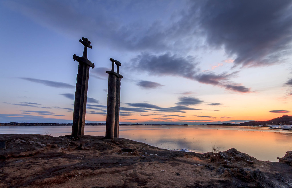 Swords in mountain Three very tall swords are planted into… Flickr