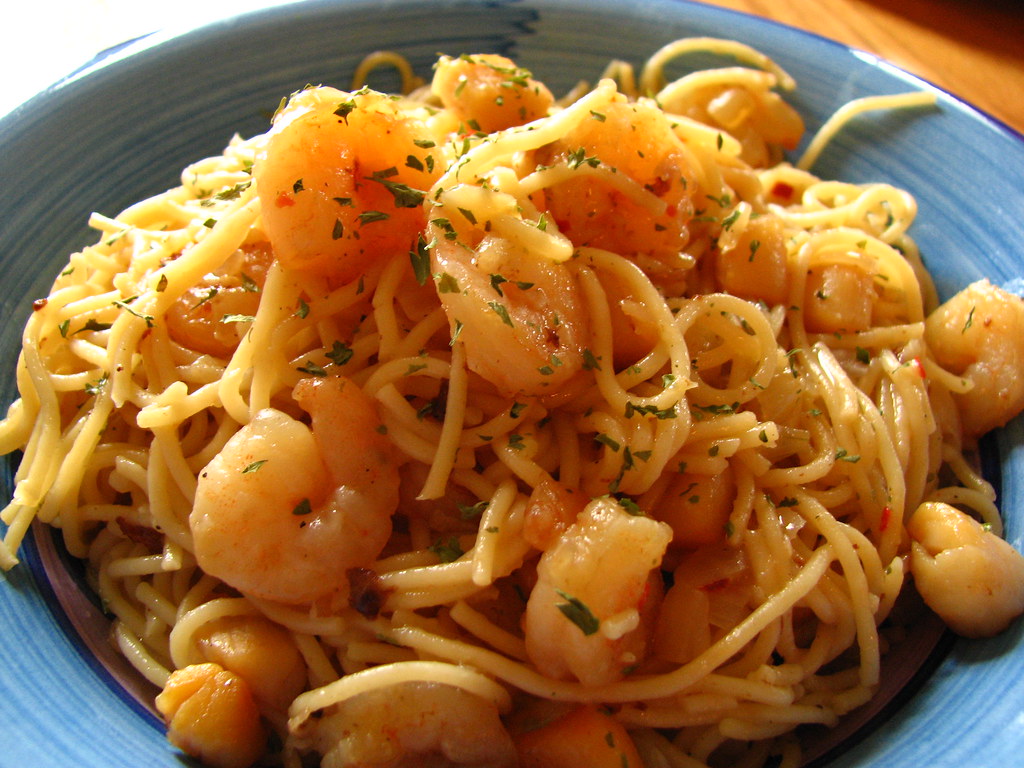 Shrimp and Scallops on Angel Hair Pasta Sauté shrimp and s… Flickr