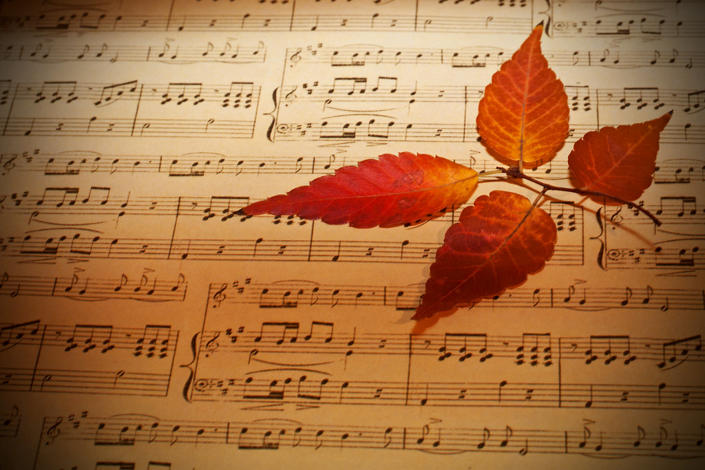 Autumn Leaves Flit Across the Sky Like Notes on a Sheet of… Flickr