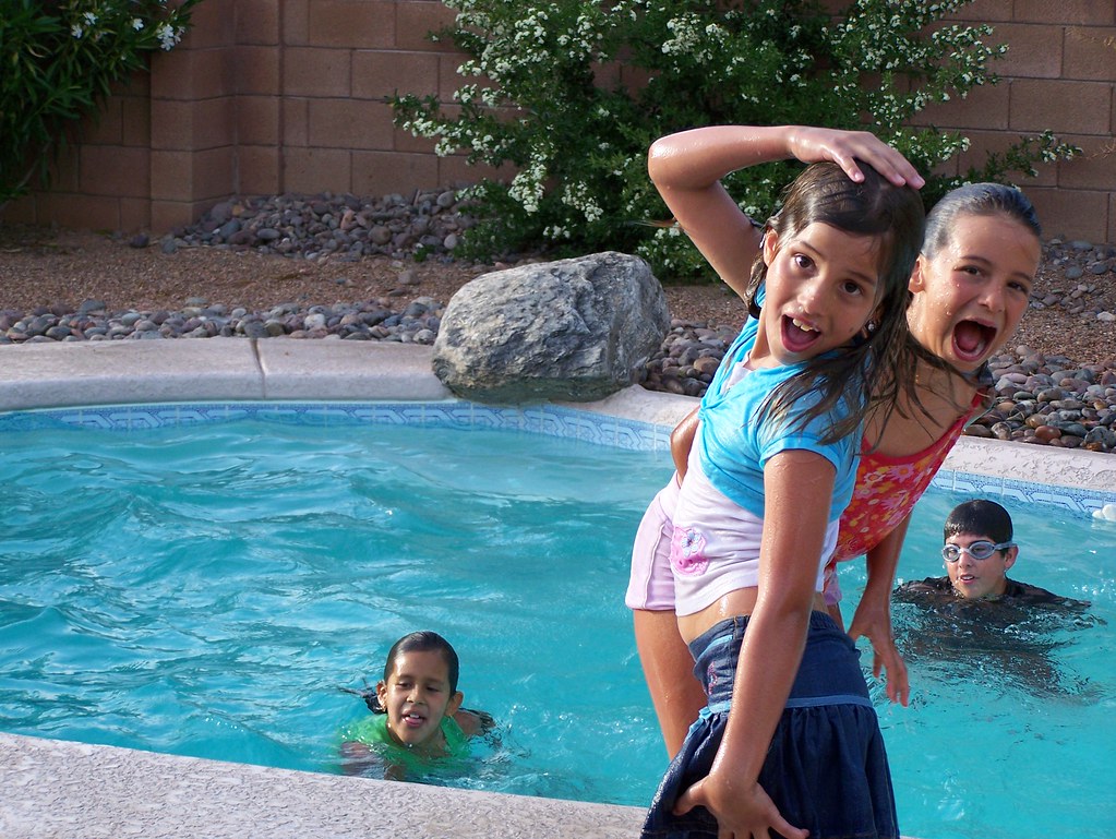 100_0030 My kids love to jump in the pool with clothes on