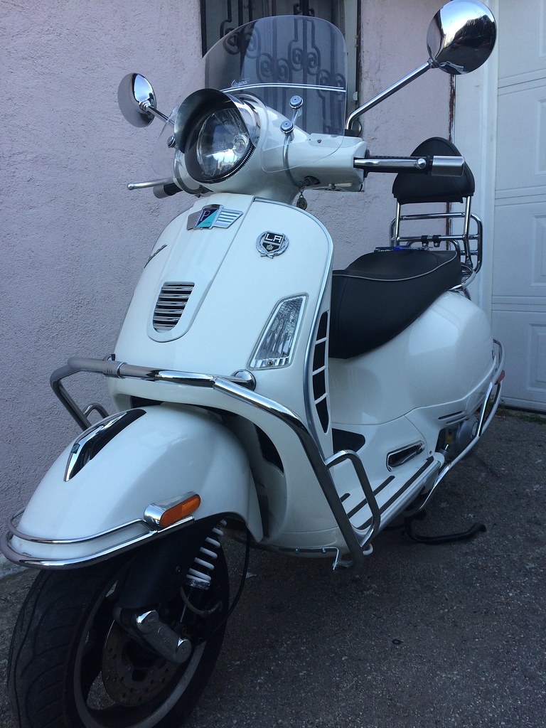 Modern Vespa GTS with front crash bars, lets see yours