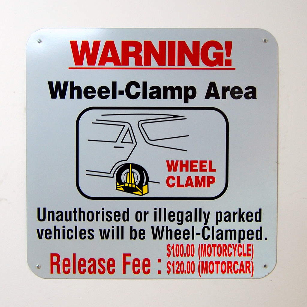 Warning. WheelClampArea Wheelclamp warning in Singapore… Flickr