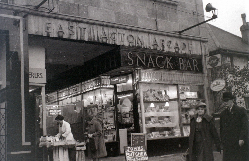 East Acton arcade, London, 5 November 1955 The board adver… Flickr