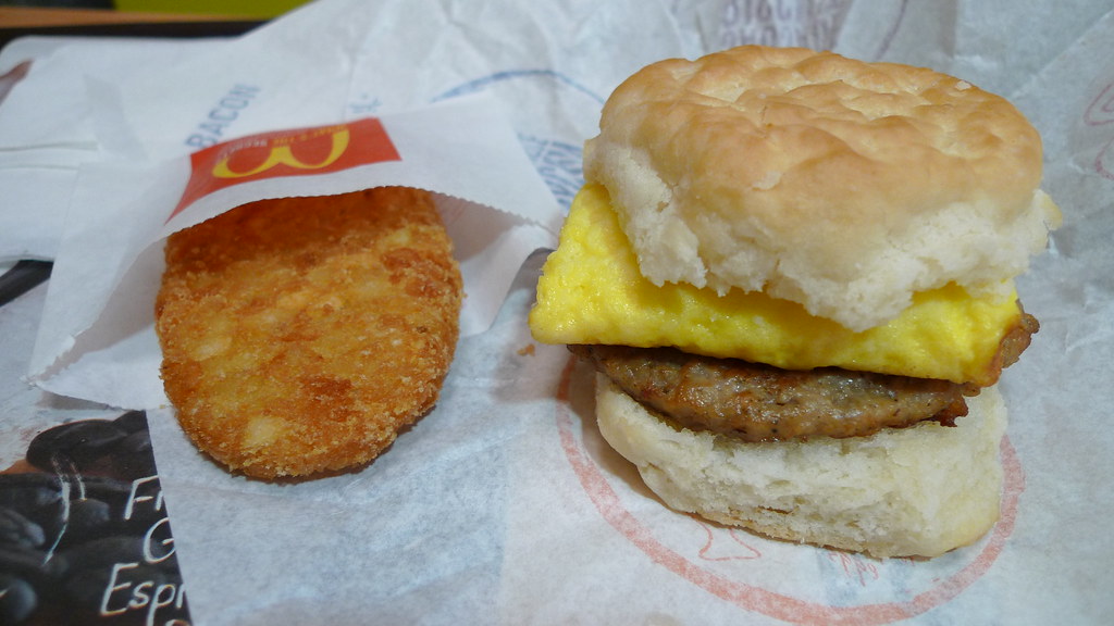 mcdonald's breakfast sausage biscuit and them hash browns atomly