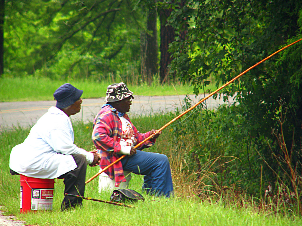 Cane Pole Fishin' Two women cane pole fishing in Doyle Arm… Flickr