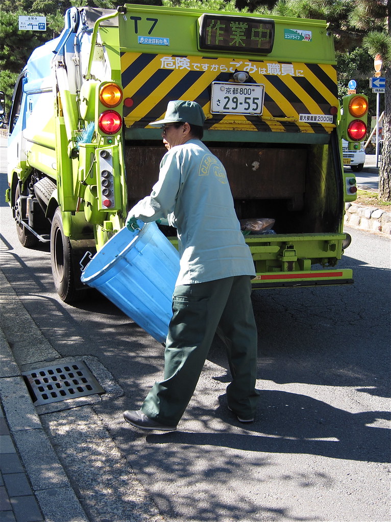 Rapid Trash Pickup This guy jumped off the truck scurrying… Flickr