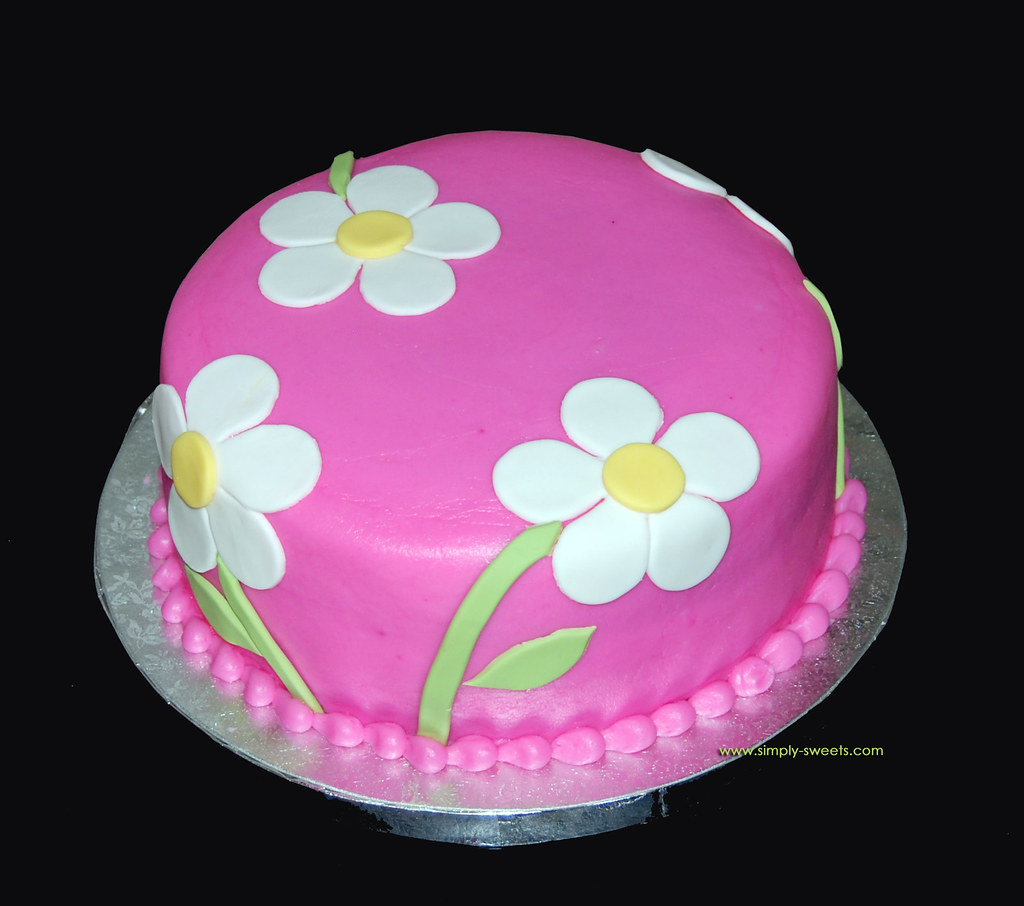 pink with white flowers birthday cake Read more about our … Flickr