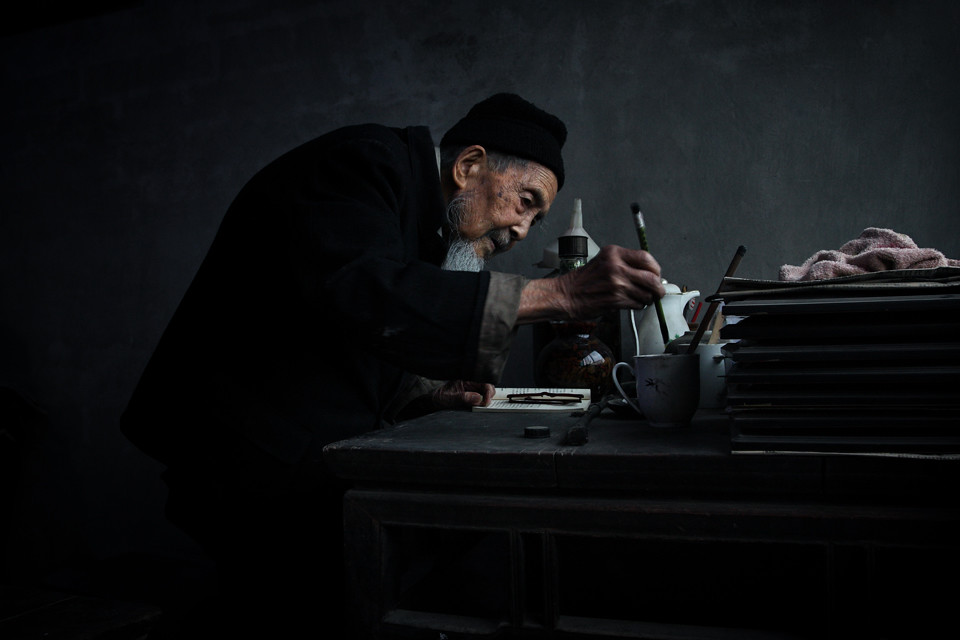 The Master at his Desk A master calligrapher, preparing