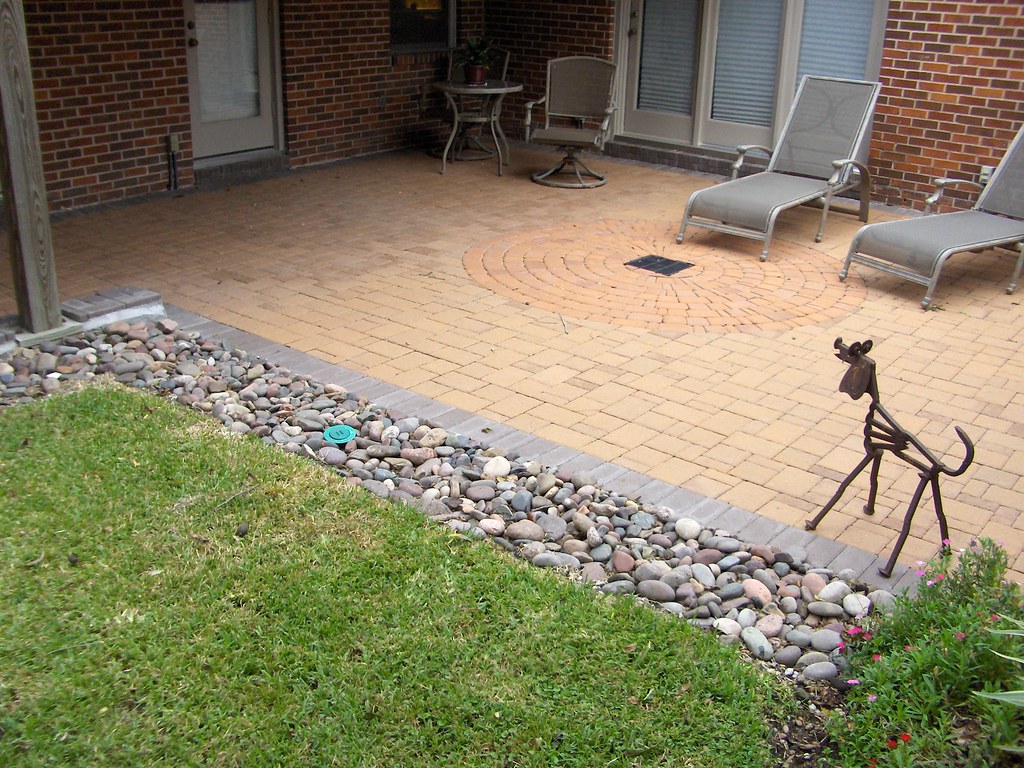 Pavers with french drain Plaza Pavers with circular patter… Flickr