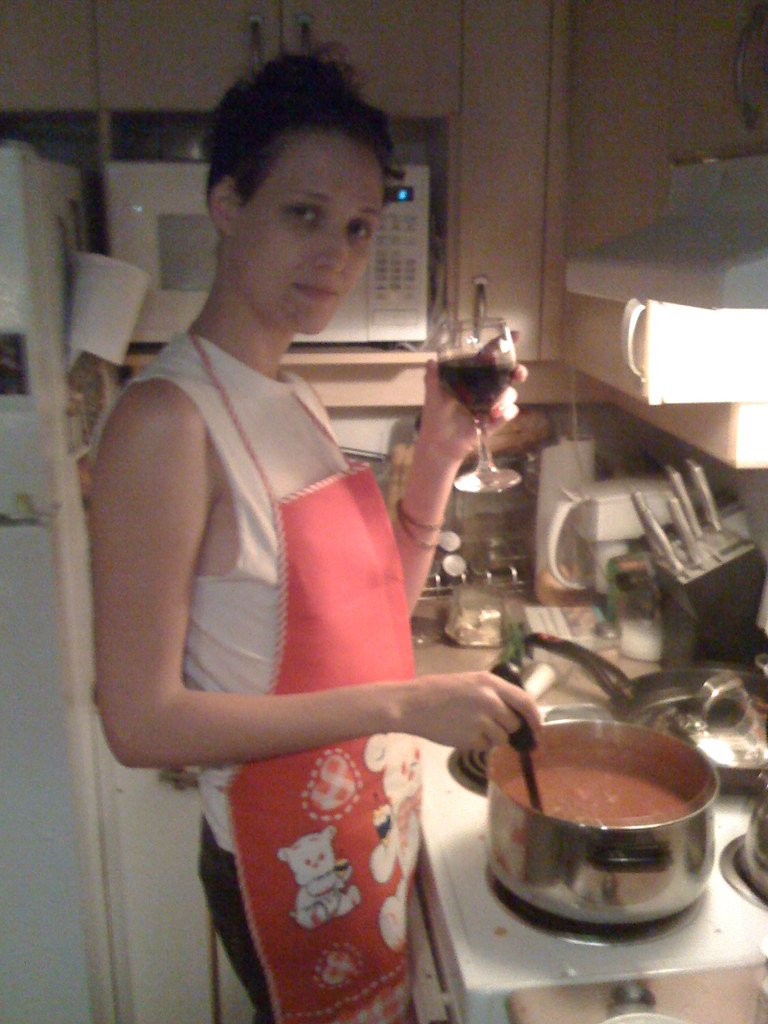 Cooking, drinking wine. kris krüg Flickr