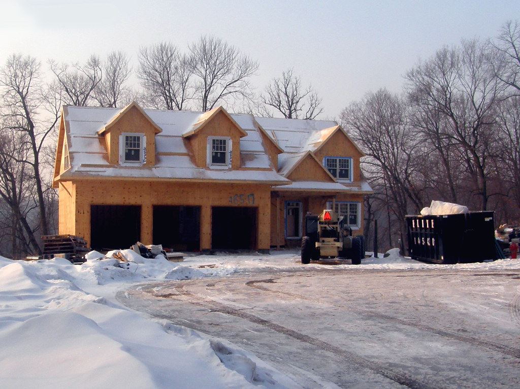 A 3 Car Garage, with house attached. Being built. In a nei… Flickr