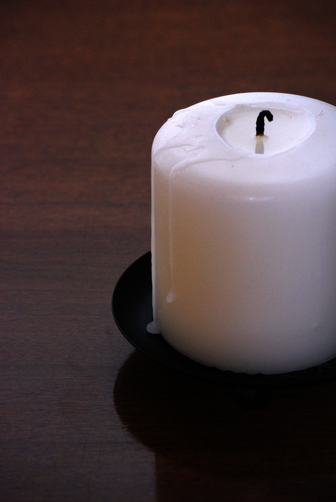 White Candle with a Burnt Wick Rachel James Flickr