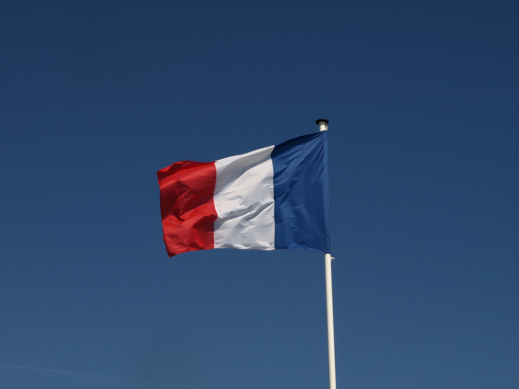 French flag Bit of a breeze up top. Joff Hopkins Flickr