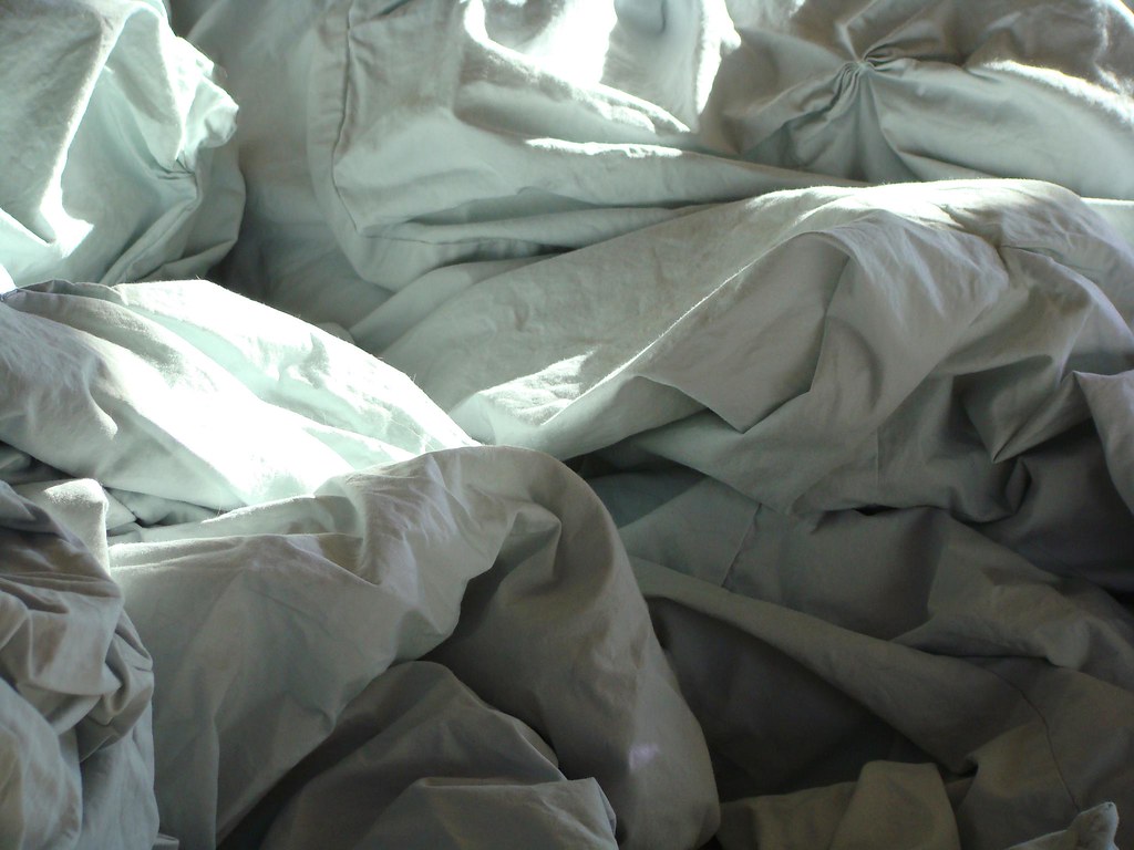 crumpled blankets stealingsand Flickr