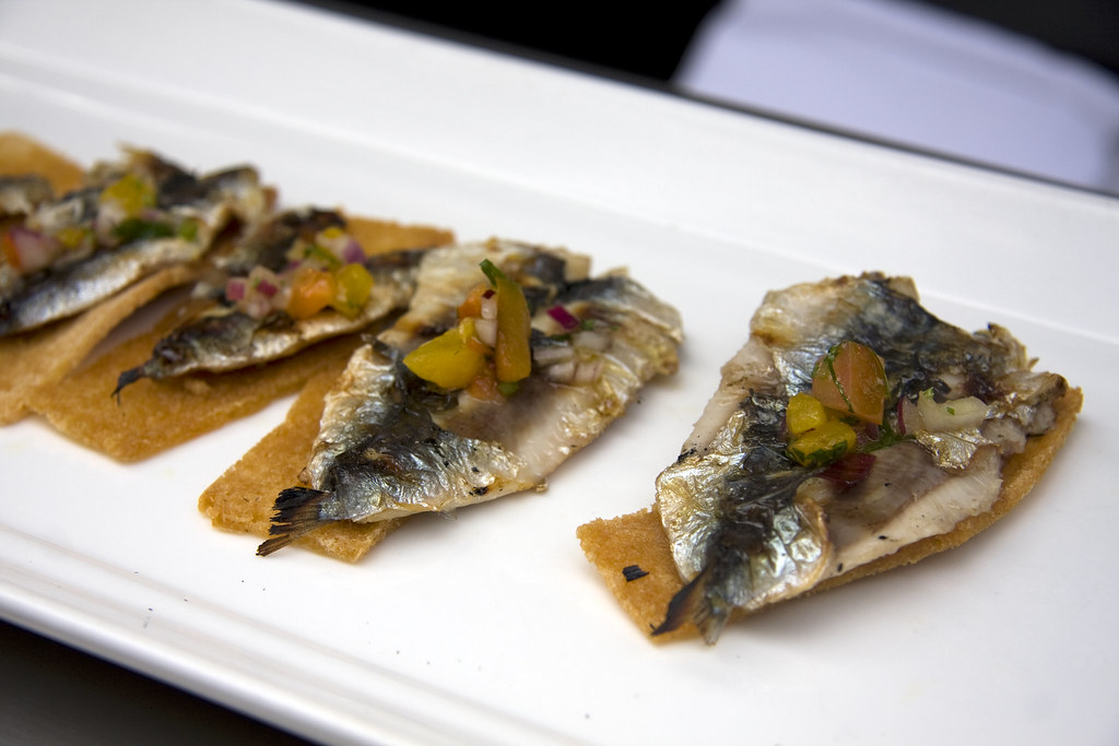 Grilled baby sardines on toasted cornbread with salsa verd… Flickr