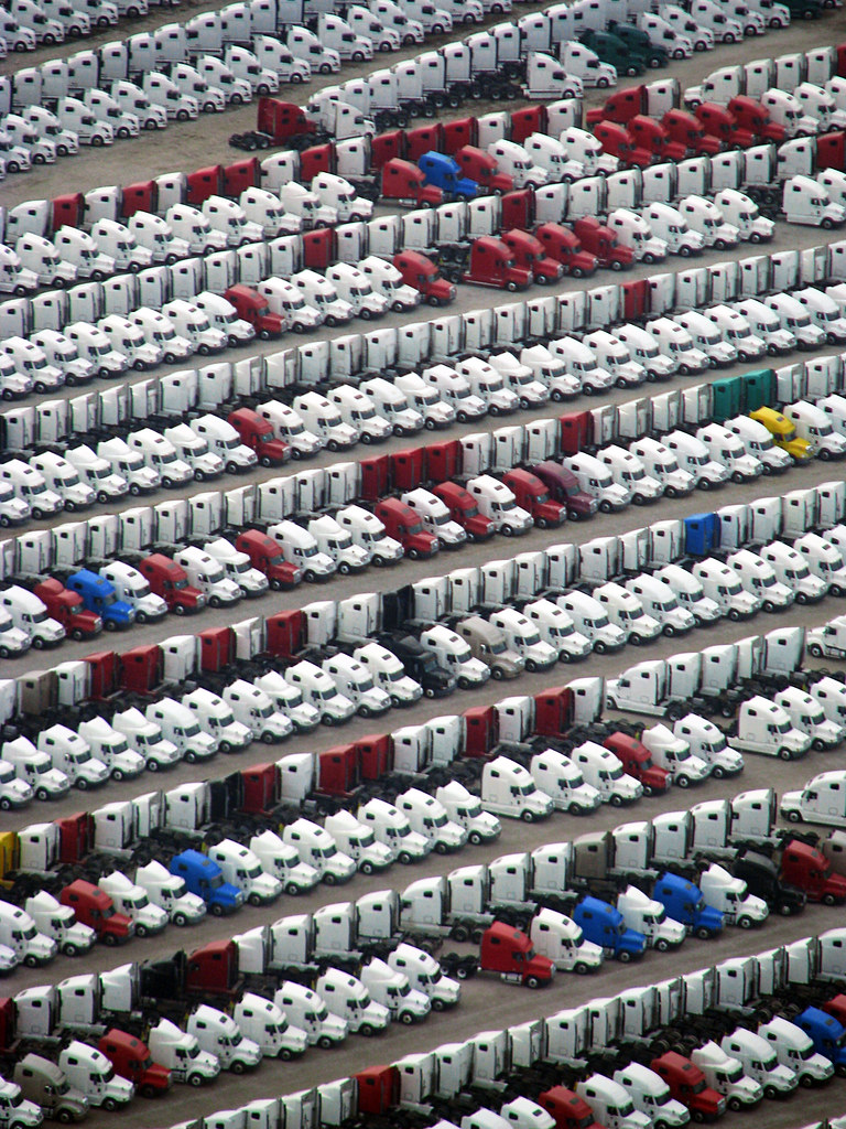 Parking Lot A parking lot full of big trucks(Peterbilts?) … Flickr
