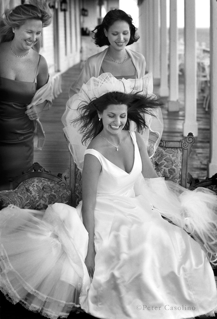 Wedding Wind A bride fights the wind as she prepares for h… Flickr