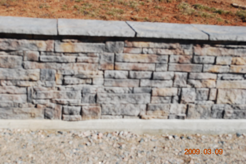New color retaining wall blocks Up close of the one with a… Flickr