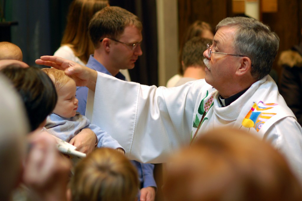 Anointing with Oil during Baptism Ceremony "'What is a sac… Flickr