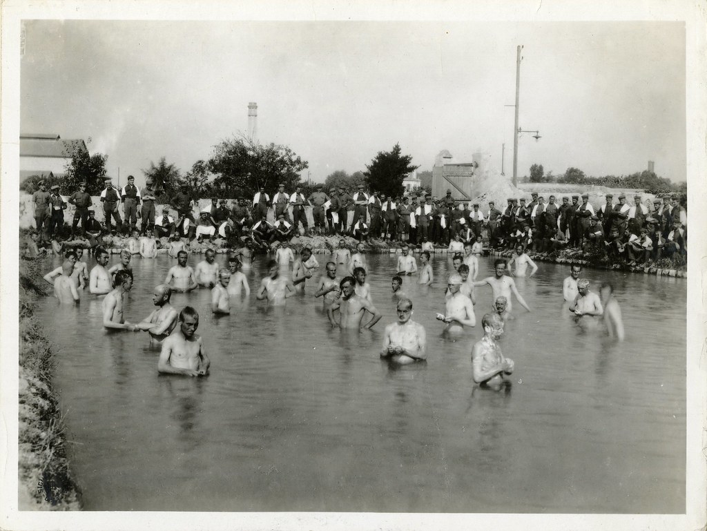 German prisoners of war taking a bath in a swimming pool (… Flickr