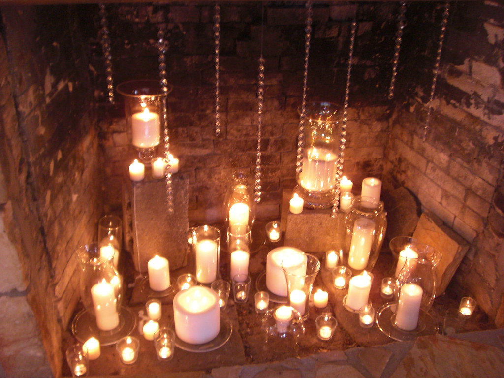 Fireplace decor Tons of candles with dripping crystals. I … Flickr