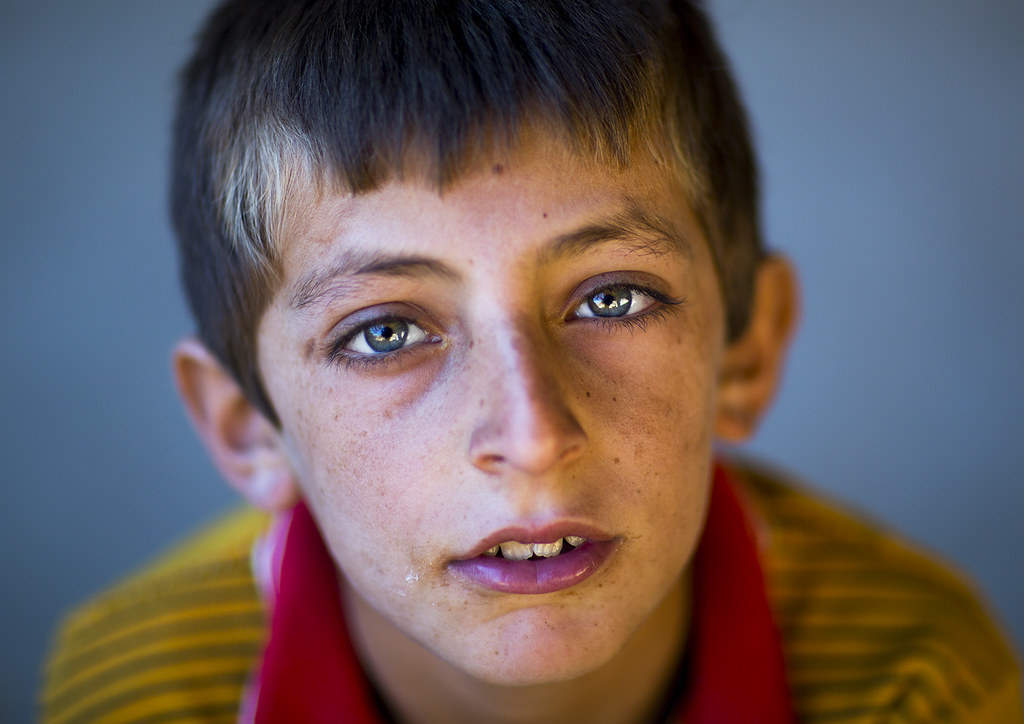 Kurdish Boy With Blue Eyes, Palangan, Iran © Eric Flickr