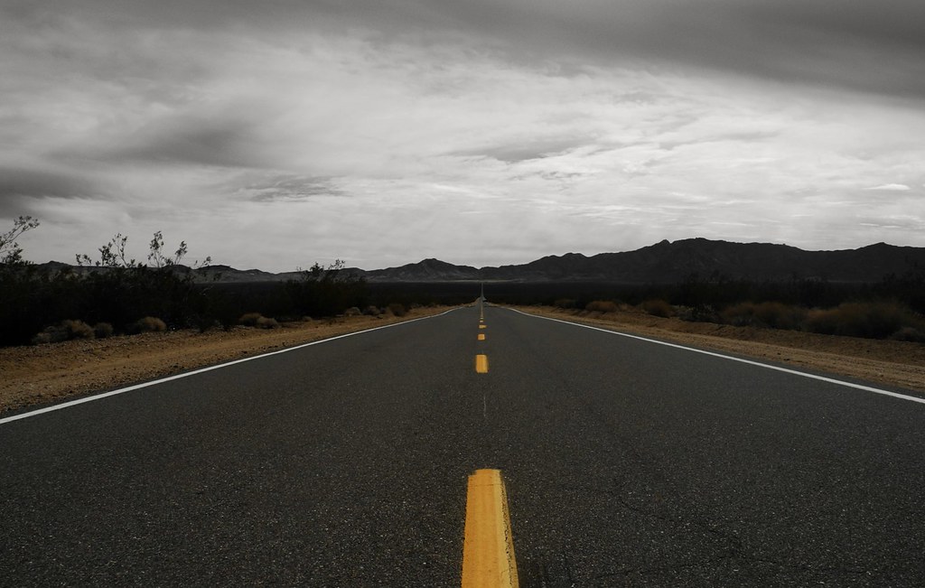 Road A long, long road to nowhere. The journey stretches o… Flickr