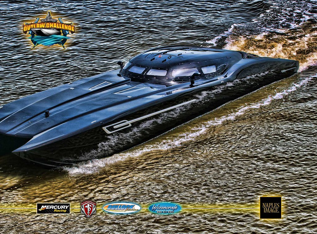 Can anyone Identify this boat? (the black one) r/boating