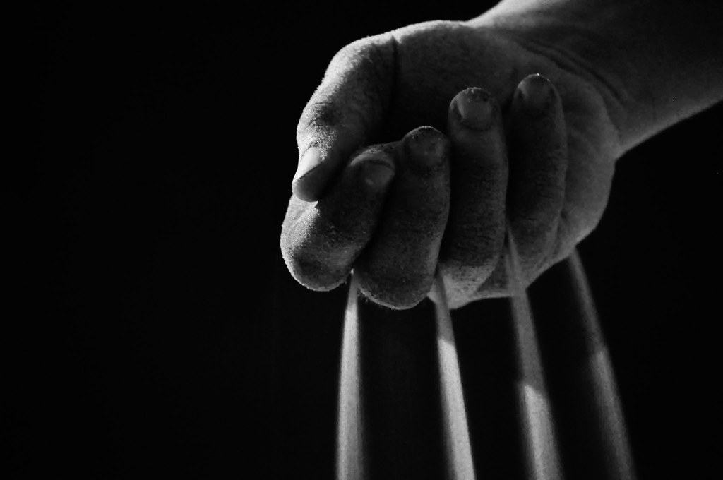 Slipping Away sand slipping from hand. Ben Ryan Flickr