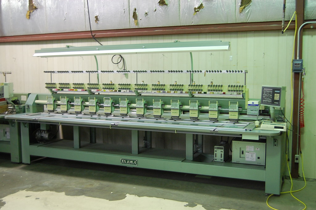 Tajima TMEF H612 embroidery machine, 12 heads, 6 needles Flickr