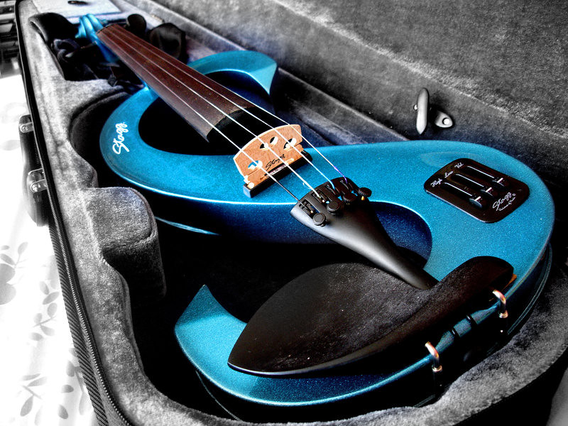 My electric violin My blue, "S" shaped, electric violin. Anna