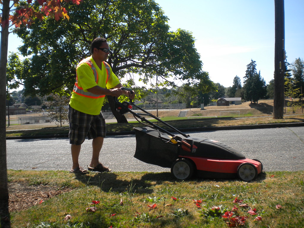 Mowing The Neighbor's Lawn My friend, Calvin Silva, mows o… Flickr