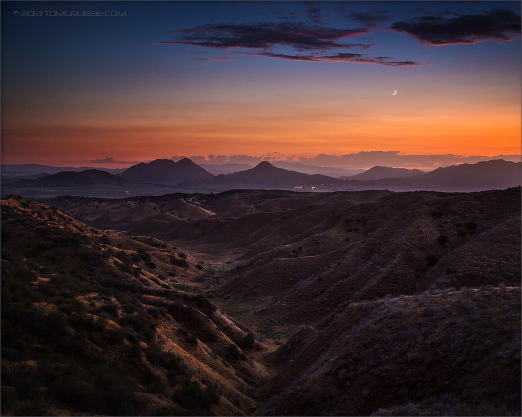 Crescent Valley A crescent moon shines over the surroundin… Flickr