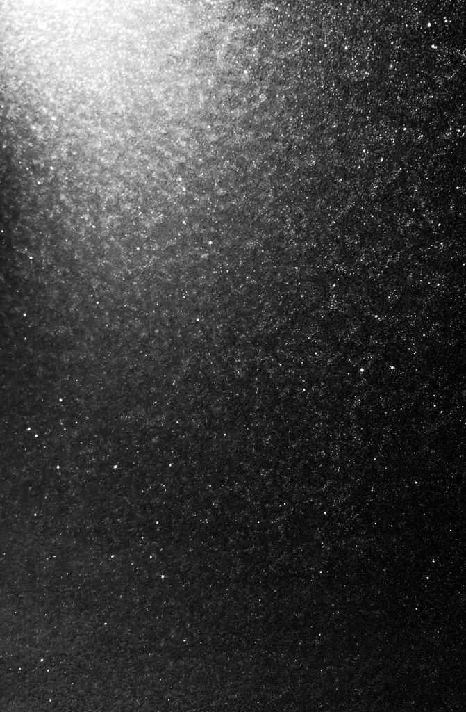 Black Shiny Surface A background of a black shiny