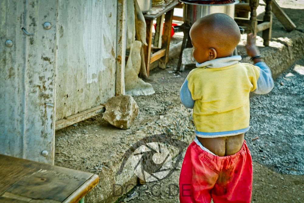 Boy with pants down A young boy is wearing his dirty pants