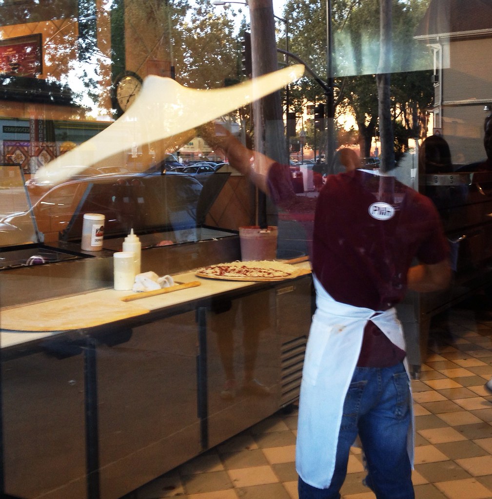Spinning and flipping the pizza dough, 117/2013 Tina Case Flickr